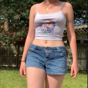 “Can you keep a secret?” white tank top